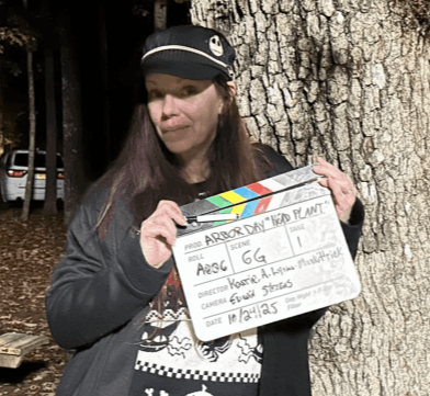 karrie holding movie clapper